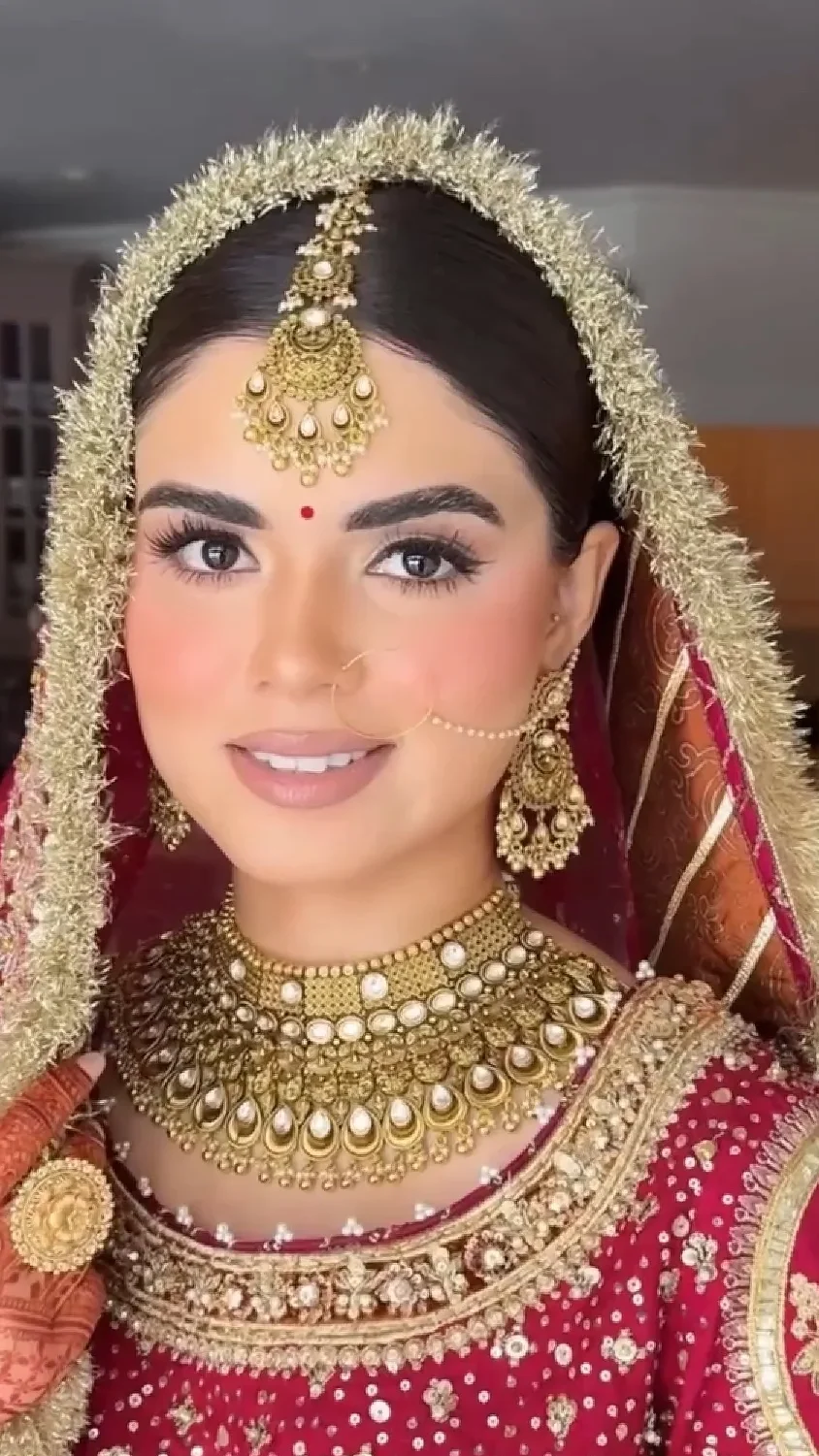 Luxury bridal makeup in Mumbai by Riti Beauty featuring an elegant Indian wedding look