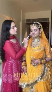 Riti Neema applying bridal makeup to a bride in Mumbai