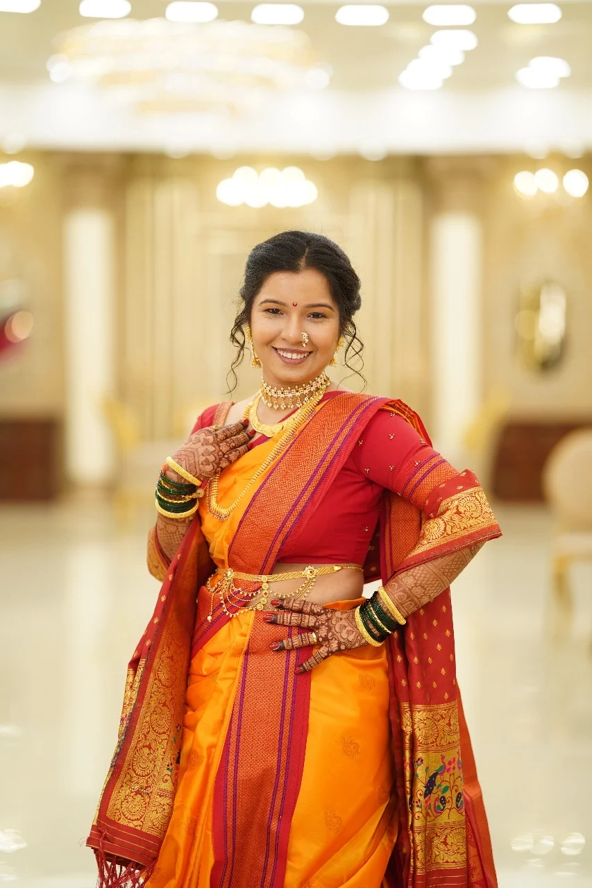 Traditional Marathi bridal makeup with nath and maang tikka by Riti Beauty, Mumbai's luxury bridal makeup artist